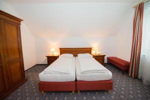 Letto o letti in una camera di Parkhotel Styria