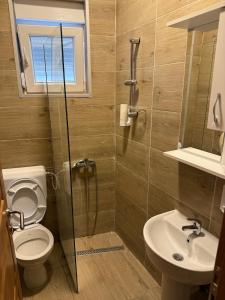 Koupelna v ubytování Rooms & Spa BJELASICA + 37 fotografií