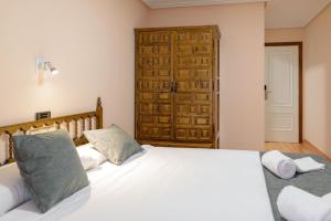 Postel nebo postele na pokoji v ubytování Hotel Alda Xinzo