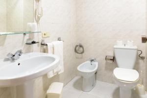 Koupelna v ubytování Hotel Alda Xinzo