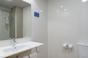 Koupelna v ubytování Hotel Alda Xinzo
