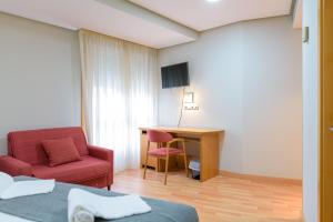TV a/nebo společenská místnost v ubytování Hotel Alda Xinzo