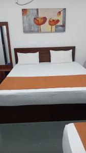 Postel nebo postele na pokoji v ubytování Leaf Dew Resort + 30 fotografií