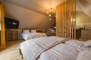 Postel nebo postele na pokoji v ubytování Bystry Comfort