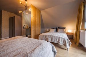 Postel nebo postele na pokoji v ubytování Bystry Comfort