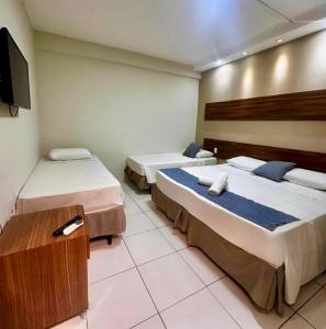 Postel nebo postele na pokoji v ubytování Hotel Pousada Alagoana