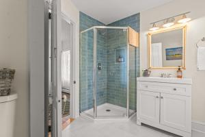 a bathroom with a shower and a sink at Charming 4BR Victorian Mystic Downtown in Groton +65 photos