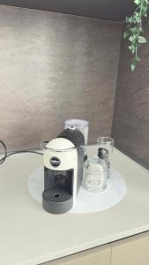 a coffee maker sitting on top of a counter at La CASA del PORTO ANTICO in Genoa