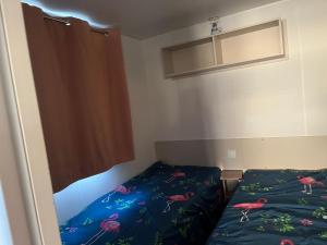 Postel nebo postele na pokoji v ubytování mobil home CANET