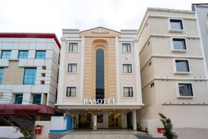 a rendering of the back of a building at Basotel Hotel Indore Vijaynagar in Indore