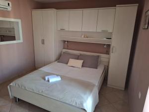 Posteľ alebo postele v izbe v ubytovaní Happy Basset Terrace