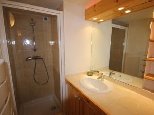 a bathroom with a sink and a shower at Charmant 2 Pièces Cabine au Cœur des Saisies - Proche Pistes et Commerces - FR-1-293-1 in Les Saisies