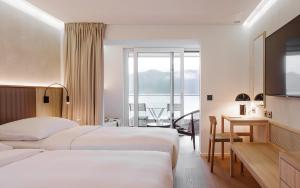 Postel nebo postele na pokoji v ubytování Campus Hotel Hertenstein + 37 fotografií