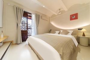 Fotografie z fotogalerie ubytování 都江堰自在天民宿 v destinaci Guankou