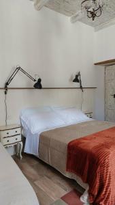 Postel nebo postele na pokoji v ubytování Selice 9 B&B