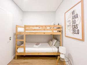 Postel nebo postele na pokoji v ubytování Viana Central - Historical City Centre Apartment + 19 fotografií