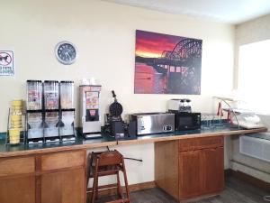 a counter in a room with a coffee shop at Econo Lodge Oacoma - Chamberlain West in Oacoma