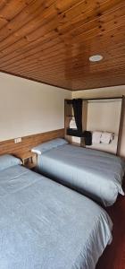 Ένα ή περισσότερα κρεβάτια σε δωμάτιο στο Apartamento San Simón