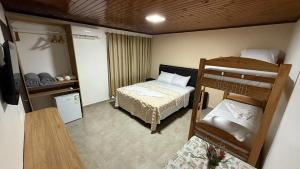 Postel nebo postele na pokoji v ubytování El Rodeo Hospedaje