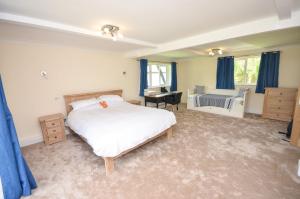 Letto o letti in una camera di The Willows Wroxham