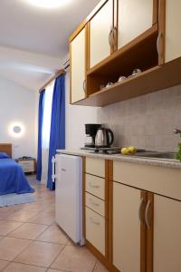 Kuchyň nebo kuchyňský kout v ubytování House Marić