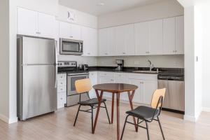 Køkken eller tekøkken på Blueground Northgate-Waverly rooftop bbq SFO-1830 + 13 billeder