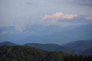 a view of the mountains with clouds in the sky at View! Private! Hot Tub,Pool Table,Fireplace,RELAX! in Sevierville +17 photos