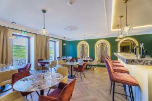 Posezení v ubytování Hôtel Le Clos des Arts