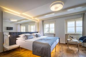 Un pat sau paturi într-o cameră la Golden Star