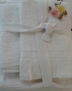 a close up of a white towel at La Casa Di Emma in Rozzano