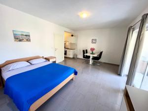 Postel nebo postele na pokoji v ubytování Paradise Apartments - Robinson getaway