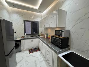 Η κουζίνα ή μικρή κουζίνα στο Magnifique chambre