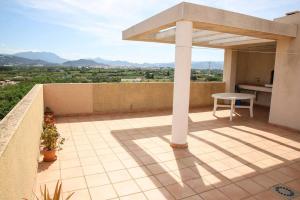 a view from the balcony of a house at Atico Piles in Piles