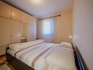 Postel nebo postele na pokoji v ubytování Apartman Baranka