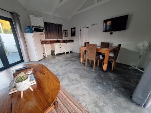 TV a/nebo společenská místnost v ubytování 66onjennings Strand