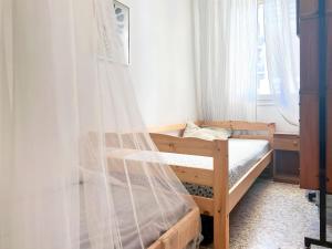 A bed or beds in a room at Zago