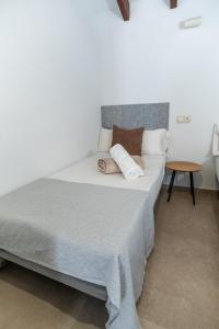 Postel nebo postele na pokoji v ubytování Iaia Carmen