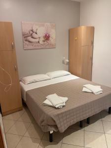 Ένα ή περισσότερα κρεβάτια σε δωμάτιο στο Residence Siesta +123 φωτογραφίες
