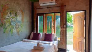 Ένα ή περισσότερα κρεβάτια σε δωμάτιο στο Pai Family House +46 φωτογραφίες