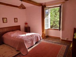 Ένα ή περισσότερα κρεβάτια σε δωμάτιο στο Maison Authentique en Ubaye +6 φωτογραφίες