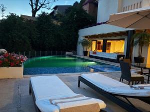 Imagen de la galería de Luxury with Lake View, Pool, Jacuzzi & Gym, en Valle de Bravo