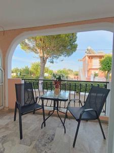 A balcony or terrace at Roussa's Apartments