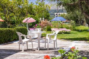 A garden outside Roussa's Apartments