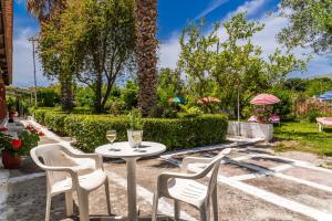 A garden outside Roussa's Apartments