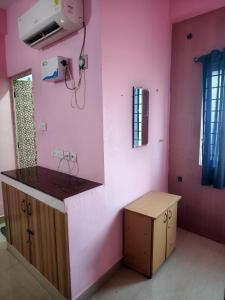 Fotografie z fotogalerie ubytování NSP ROOMS NS complex v destinaci Singapperumālkovil