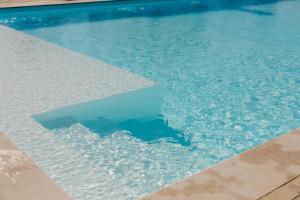The swimming pool at or close to Villa Topazio