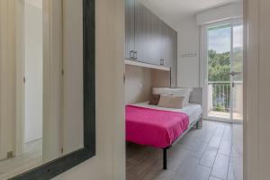 Postel nebo postele na pokoji v ubytování Lido degli Estensi Seaview Apartment