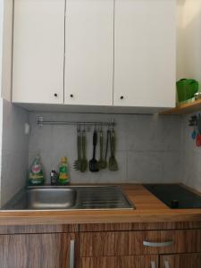 Kuchyň nebo kuchyňský kout v ubytování Downtown Seafront apartment