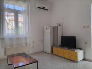 TV a/nebo společenská místnost v ubytování Downtown Seafront apartment