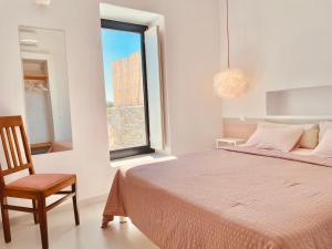 Postel nebo postele na pokoji v ubytování Spiti su in Paros - Naousa Piscina Privata